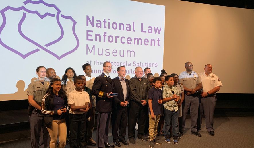 The National Law Enforcement Museum Fund awards the Prince George&#x27;s County Police Department its Hero Award for community involvement for the department&#x27;s Police Athletic League program for county youth on Monday, June 17, 2019. (Ximena Bustillo /The Washington Times)

