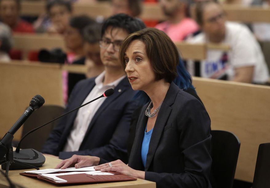 Myrna Maloney Flynn, vice president, Massachusetts Citizens for Life, right, testifies against a proposed bill, called the "Roe Act" by supporters, during a public hearing as David Franks, chairman of Mass. Citizens for Life, left, looks on during a public hearing at the Statehouse, Monday, June 17, 2019, in Boston. Proponents on both sides of the abortion issue testified during the public hearing on a bill that would let women obtain an abortion after 24 weeks of pregnancy in cases of "fatal fetal anomalies." (AP Photo/Steven Senne)