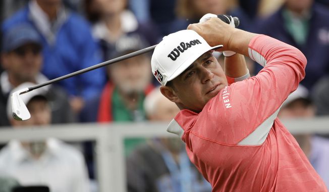 Gary Woodland watches his tee shot on the first hole during the final round of the U.S. Open Championship golf tournament Sunday, June 16, 2019, in Pebble Beach, Calif. (AP Photo/Marcio Jose Sanchez) **FILE**