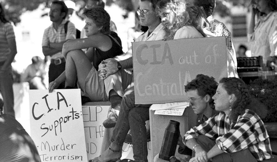 University of New Mexico students in Albuquerque, N.M. forced the CIA to cancel a recruitment event at the Student Union Building in Sept. 1988. An active-duty CIA intelligence officer will be embedded on the University of New Mexico&#x27;s campus and will carry a teaching or research load comparable to faculty colleagues, according to a new agreement. (Jeff Alexander/The Albuquerque Journal via AP)