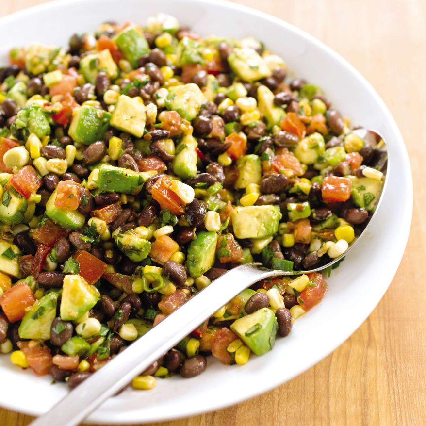 This undated photo provided by America's Test Kitchen in June 2019 shows a Southwestern Black Bean Salad in Brookline, Mass. This recipe appears in "The Complete Diabetes Cookbook." (Daniel J. van Ackere/America's Test Kitchen via AP)