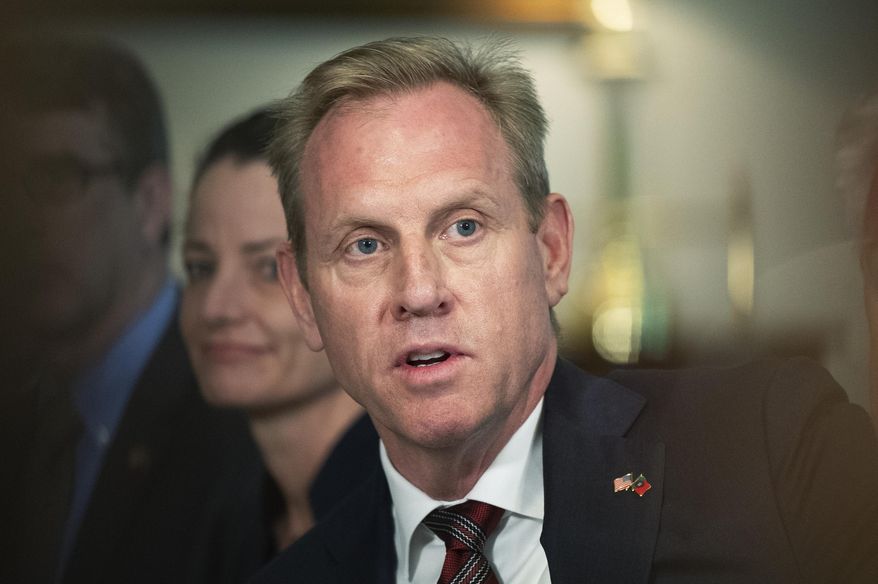 In this Feb. 14, 2019 file photo, acting Secretary of Defense Patrick Shanahan speaks about the situation in the Persian Gulf region during a meeting with Portuguese Minister of National Defense Joao Cravinho, at the Pentagon. President Donald Trump has placed acting officials in key posts in significantly higher numbers than his recent predecessors. The practice lets him quickly, if temporarily, install allies in important positions while circumventing the Senate confirmation process, which can be risky with Republicans running the chamber by a slim 53-47 margin. (AP Photo/Manuel Balce Ceneta, File)