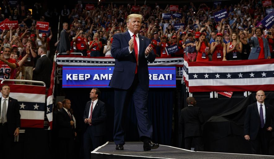 President Donald Trump arrives to speak at his reelection kickoff rally at the Amway Center, Tuesday, June 18, 2019, in Orlando, Fla. (AP Photo/Evan Vucci)