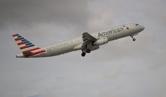 In this Thursday, Nov. 29, 2018, photo, an American Airlines Airbus A321 takes off from Fort Lauderdale–Hollywood International Airport in Fort Lauderdale, Fla. On Friday, June 14, 2019, a federal judge ordered unions that represent American Airlines mechanics not to interfere in the airline&#39;s operations. (AP Photo/Wilfredo Lee)