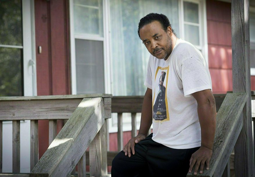 FILE - This Oct. 3, 2018, file photo, shows Karle Robinson, 61, in Tonganoxie, Kan. Robinson, who was detained by police while moving into his home said Wednesday, June 19, 2019, that Kansas regulators investigated his racial bias complaint and closed the case with no further action. (Tammy Ljungblad/The Kansas City Star via AP, File)