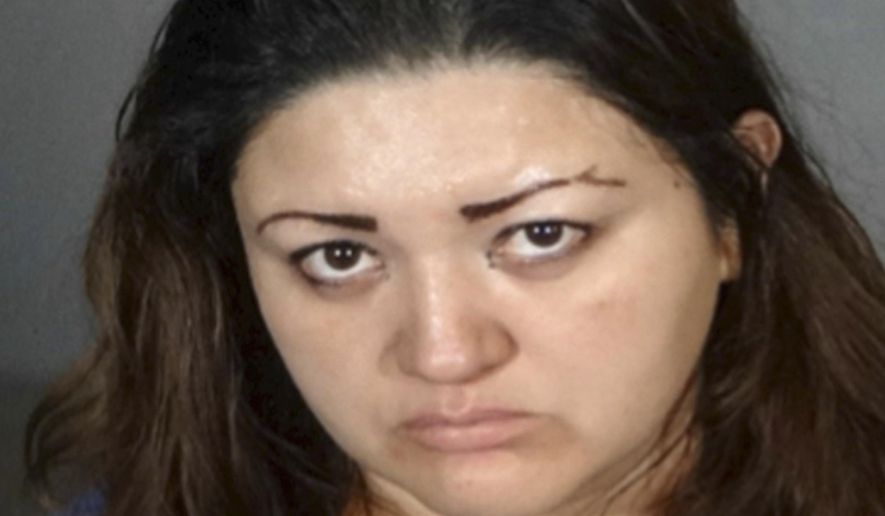 FILE - This undated booking photo provided by the Los Angeles Police Department shows Veronica Aguilar. A preliminary hearing is underway this week of June 17, 2019, in the case of Aguilar, a Los Angeles mother accused of keeping her special-needs son locked in a closet, ultimately causing his death. (Los Angeles Police Department via AP, File)
