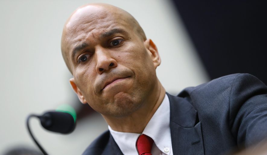 Democratic Presidential candidate Sen. Cory Booker, D-N.J., waits to testify about reparation for the descendants of slaves during a hearing before the House Judiciary Subcommittee on the Constitution, Civil Rights and Civil Liberties, at the Capitol in Washington, Wednesday, June 19, 2019. (AP Photo/Pablo Martinez Monsivais) ** FILE **