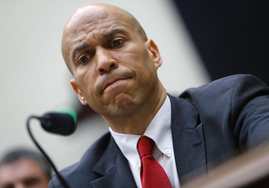 Democratic Presidential candidate Sen. Cory Booker, D-N.J., waits to testify about reparation for the descendants of slaves during a hearing before the House Judiciary Subcommittee on the Constitution, Civil Rights and Civil Liberties, at the Capitol in Washington, Wednesday, June 19, 2019. (AP Photo/Pablo Martinez Monsivais) ** FILE **