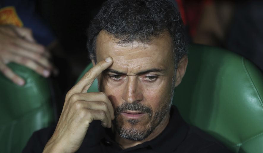 FILE - In this Oct. 15, 2018 file photo, Spain&#x27;s national soccer coach Luis Enrique gestures before the UEFA Nations League soccer match between Spain and England at Benito Villamarin stadium, in Seville, Spain. Luis Enrique is stepping down as coach for the Spanish national team for personal reasons it was announced by Spanish soccer federation president Luis Rubiales on Wednesday June 19, 2019. Assistant coach Robert Moreno will take over. (AP Photo/Miguel Morenatti, File)