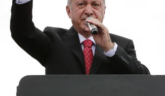 Turkey&#39;s President Recep Tayyip Erdogan, gestures as he talks during a campaign rally in Istanbul for the June 23 re-run of Istanbul elections, Wednesday, June 19, 2019. Erdogan has claimed that former Egyptian President Mohammed Morsi did not die of natural causes but that he was killed. At the campaign speech Erdogan offered as evidence the fact that the deposed president allegedly &amp;quot;flailed&amp;quot; in court for 20 minutes and that nobody assisted him. (Presidential Press Service via AP, Pool)