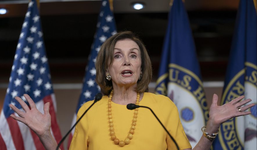 Speaker of the House Nancy Pelosi, D-Calif., meets with reporters before joining congressional leaders at a closed-door security briefing on the rising tensions with Iran, at the Capitol in Washington, Thursday, June 20, 2019. (AP Photo/J. Scott Applewhite)