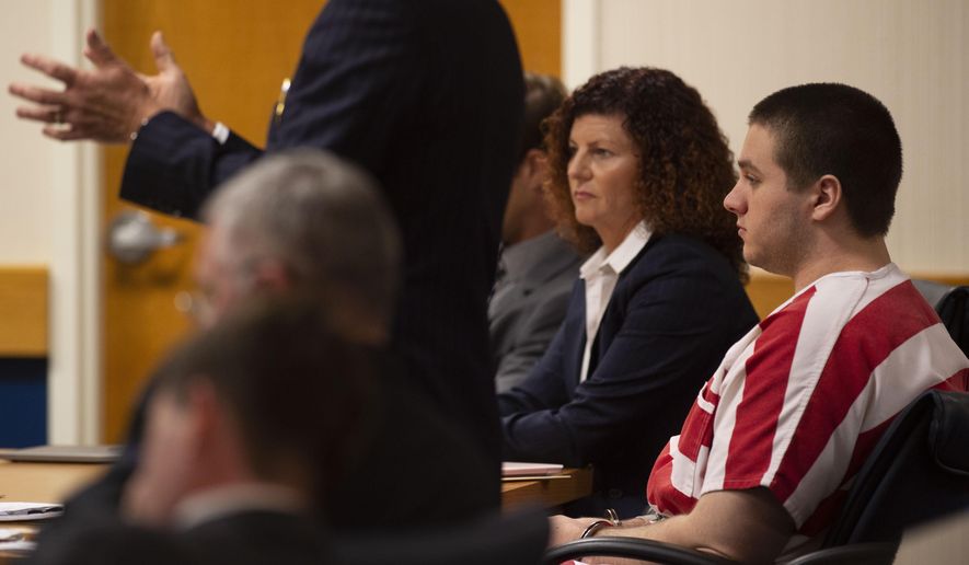 Austin Harrouff, right, who is accused of killing a Tequesta couple in 2016, listens as his attorney Robert Watson addresses Martin County Circuit Judge Sherwood Bauer, Jr. (not pictured) during a hearing Thursday, June 13, 2019, at the Martin County Courthouse in Stuart, Fla. Attorneys for the Florida man accused of killing a couple and chewing the husband’s face attacked the constitutionality of the state’s laws governing insanity defenses, arguing it wrongly places the burden of proof on defendants instead of prosecutors. (Leah Voss/TCPalm.com via AP)