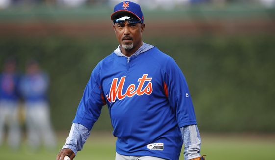 New York Mets interim bullpen coach Ricky Bones walks in from the outfield during batting practice for the team&#39;s baseball game against the Chicago Cubs on Thursday, June 20, 2019, in Chicago. (AP Photo/Jim Young) **FILE**