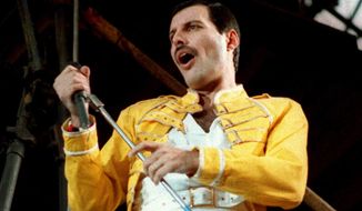 FILE - In this July 20, 1986 file photo, Queen lead singer Freddie Mercury performs, in Germany.  A previously unheard and unreleased song by Mercury was released Thursday, June 20, 2019.  Universal Music announced that the track, “Time Waits for No One,” was originally recorded in 1986 for the concept album of the musical “Time” with musician Dave Clark. A video to accompany the song was also released and includes unseen performance footage of Mercury. It was recorded in April 1986 at London’s Dominion Theatre.  (AP Photo/Marco Arndt, File)