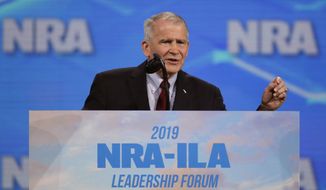 FILE- In this April 26, 2019 photo, Nation Rifle Association President Col. Oliver North speaks at the National Rifle Association Institute for Legislative Action Leadership Forum at Lucas Oil Stadium in Indianapolis. On Wednesday, June 20, 2019, the NRA filed suit against North for what it called &amp;quot;conduct harmful to the NRA.&amp;quot; The lawsuit said that North &amp;quot;departed office after a widely publicized, failed coup attempt.&amp;quot; (AP Photo/Michael Conroy, File)