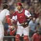 Washington Nationals catcher Kurt Suzuki extends a gesture to Philadelphia Phillies&#39; Bryce Harper, a former National, after tagging him out during the fourth inning of a baseball game in Washington, Thursday, June 20, 2019. (AP Photo/Manuel Balce Ceneta) ** FILE **