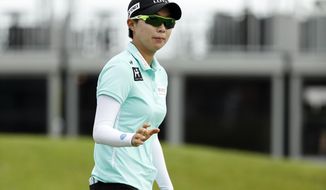 Hyo Joo Kim, of South Korea, reacts after making a birdie putt on the ninth green during the first round of the KPMG Women&#39;s PGA Championship golf tournament, Thursday, June 20, 2019, in Chaska, Minn. (AP Photo/Charlie Neibergall)