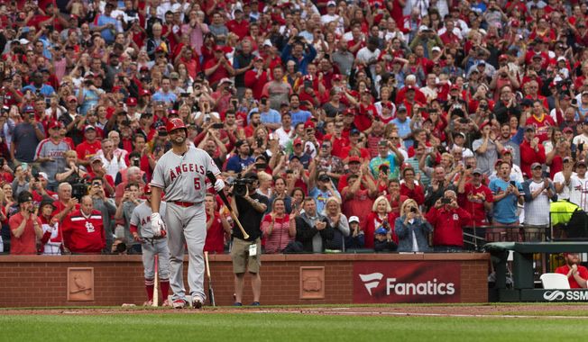Los Angeles Angels&#x27; Albert Pujols (5) is greeted by a standing ovation before his first at-bat during the first inning a baseball game against the St. Louis Cardinals, Friday, June 21, 2019, in St. Louis. (AP Photo/L.G. Patterson)