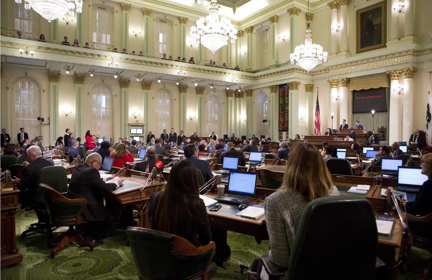 FILE - In this Jan. 3, 2018, file photo, the California State Assembly meets on the first day of the 2018 session at the Capitol in Sacramento, Calif. A state commission met Friday, June 21, 2019, to set the pay for legislators and the governor. (AP Photo/Steve Yeater, File)