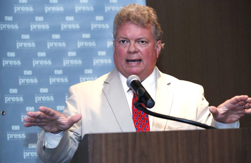 Mississippi Attorney General Jim Hood, a candidate for the Democratic nomination for governor, addresses editors and publishers at the annual Mississippi Press Association Candidates Forum in Biloxi, Miss., Friday, June 21, 2019. (AP Photo/Rogelio V. Solis)
