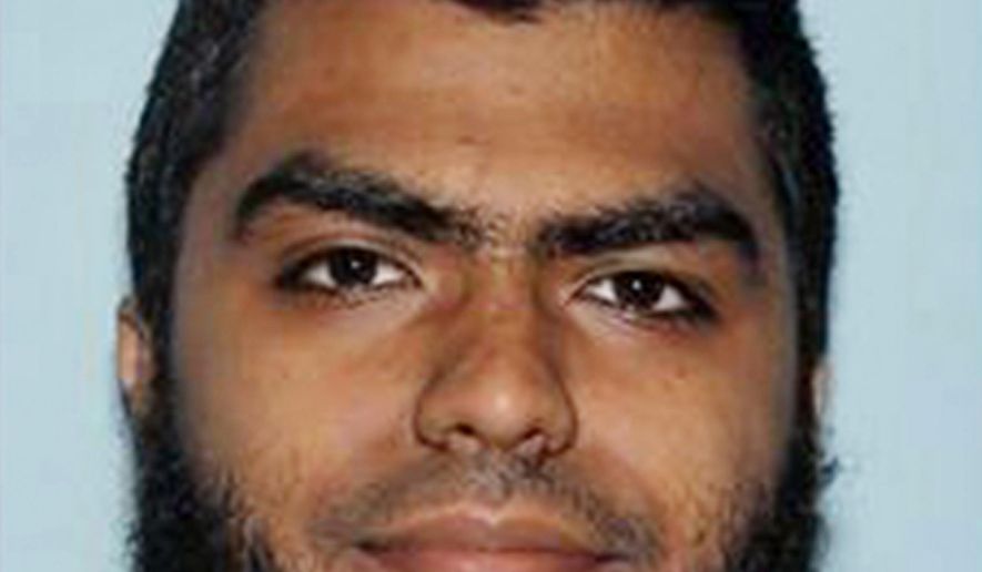 FILE - This undated file photo provided by the Maricopa County Sheriff's Office shows Ismail Hamed, who authorities say was shot by a sheriff's sergeant earlier this year after Hamed threw rocks at and wielded a knife toward the officer. Records released by investigators say Hamed, who pledged his allegiance to the Islamic State before attacking the officer, had used text messages in the proceeding months to spread terror propaganda among his friends. Hamed, who survived the shooting, has pleaded not guilty to aggravated assault and terrorism charges stemming from the Jan. 7 attack. (Maricopa County Sheriff's Office via AP, File)