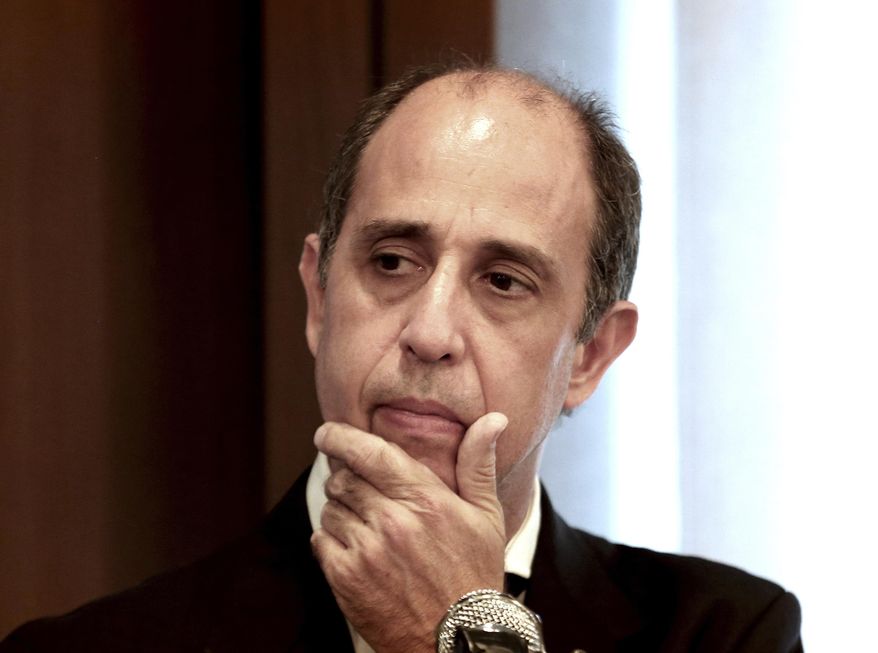 Tomas Ojea Quintana, the United Nations special rapporteur on the situation of human rights in North Korea, listens to a question during a press conference in Seoul, South Korea, Friday, June 21, 2019. Quintana said there are signs the country and China are strengthening their efforts to track down people who have escaped from the North. (AP Photo/Ahn Young-joon)