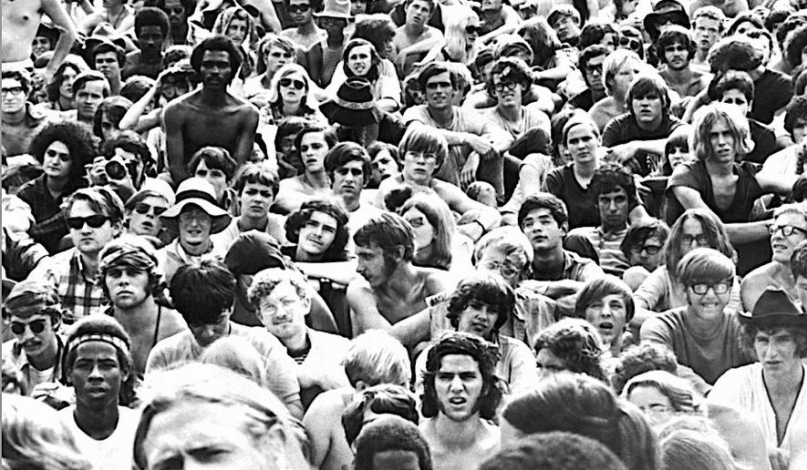 One analyst says that the first Democratic presidential debate will draw the largest gathering of liberals &quot;since Woodstock,&quot; pictured here in 1969. (Associated Press)