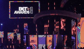 FILE - This June 24, 2018 file photo shows a view of the stage at the BET Awards in Los Angeles. Regina Hall will host the show, which is being held Sunday, June 23, 2019, at Los Angeles’ Microsoft Theater and will feature performances by Cardi B, DJ Khaled, Migos, H.E.R., Lizzo, Lil Nas X and Billy Ray Cyrus. (Photo by Richard Shotwell/Invision/AP, File)
