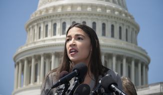 Rep. Alexandria Ocasio-Cortez, D-N.Y., speaks at a news conference with Democratic presidential candidate, Sen. Bernie Sanders, I-Vt., to call for legislation to cancel all student debt, at the Capitol in Washington, Monday, June 24, 2019. (AP Photo/J. Scott Applewhite) ** FILE **