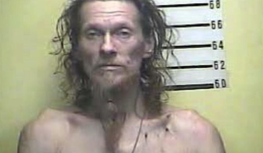 This image provided by the Bell County Detention Center shows Charles E. Lawson, who was arrested Monday morning, June 24, 2019, following a standoff with police in Bell County, Ky. Kentucky State Police say lawson is accused of firing shots into a residence, starting a fire and shooting at responding officers. (Bell County Detention Center via AP)