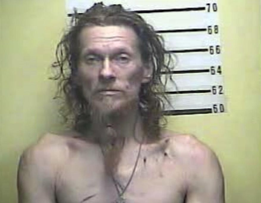 This image provided by the Bell County Detention Center shows Charles E. Lawson, who was arrested Monday morning, June 24, 2019, following a standoff with police in Bell County, Ky. Kentucky State Police say lawson is accused of firing shots into a residence, starting a fire and shooting at responding officers. (Bell County Detention Center via AP)
