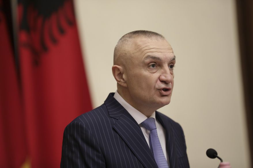 FILE - In this June 10, 2019 file photo, Albanian President Ilir Meta speaks during a news conference in Tirana, Albania. Meta condemned a decision by electoral authorities in favor of holding municipal elections this weekend, saying on Tuesday, June 25, 2019, that the ruling Socialists should hold talks and not carry out an “imaginary” voting process.  (AP Photo/Hektor Pustina, File)