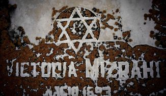 The Star of David decorates a tomb eroded by moss at the Jewish cemetery in Guanabacoa in eastern Havana, Cuba, June 7, 2019. Slowly, the first Jewish cemetery in Cuba is beginning to be rehabilitated, along with the memory of many of the island&#39;s early Jewish forebears. (AP Photo/Ramon Espinosa)