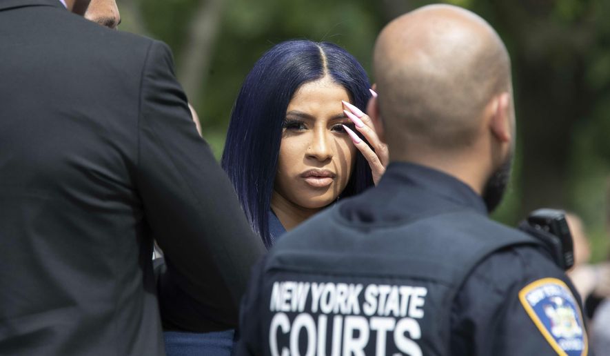 Rapper Cardi B leaves Queens County Criminal Court, Tuesday, June 25, 2019, in New York. (AP Photo/Mary Altaffer)