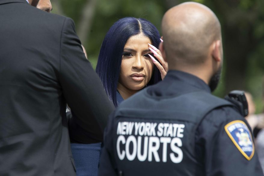 Rapper Cardi B leaves Queens County Criminal Court, Tuesday, June 25, 2019, in New York. (AP Photo/Mary Altaffer)