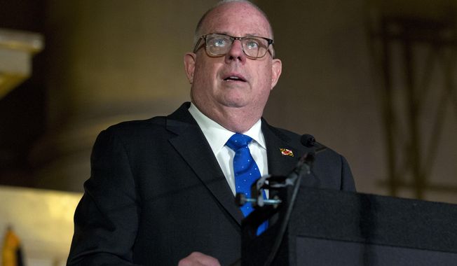 FILE - In this May 9, 2019 file photo, Maryland Gov. Larry Hogan speaks during the Baltimore Mayor Bernard &amp;quot;Jack&amp;quot; Young swearing-in ceremony at War Memorial Building in Baltimore. The Maryland Democratic Party’s director is asking the state board of elections to investigate possible campaign finance violations by the governor, accusing a large network of donors of exceeding the $6,000 legal donation limit.  (AP Photo/Jose Luis Magana, File)