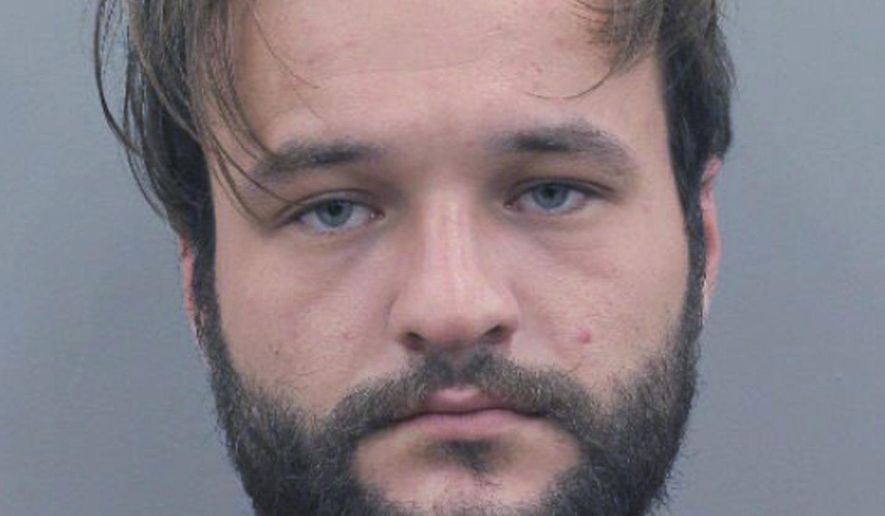 This photo provided by the Houston Police Department shows Jason Paul Robin. Robin, the father of a Houston infant, has been charged in her death after an autopsy found the child suffered a cracked skull and more than 90 fractures just days after being brought home from the hospital. Harris County prosecutors said Monday, June 24, 2019, that Jazmine Robin, who was born prematurely, was 10 weeks old when she died July 15, 2018, 12 days after leaving the hospital. Robin, and Jazmine's mother, 21-year-old Katharine Wyndham White, are facing charges. (Houston Police Department via AP)