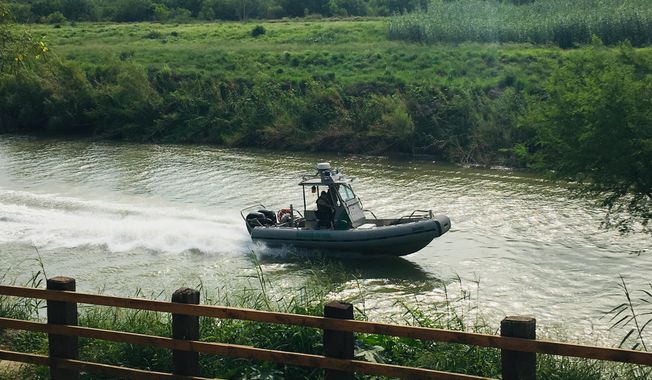 A U.S. Border Patrol boat navigates the Rio Grande near where the bodies of Salvadoran migrant Oscar Alberto Martínez Ramírez and his nearly 2-year-old daughter Valeria were found, in Matamoros, Mexico, Monday, June 24, 2019, after they drowned trying to cross the river to Brownsville, Texas. Martinez&#x27; wife, Tania told Mexican authorities she watched her husband and child disappear in the strong current. (AP Photo/Julia Le Duc)