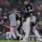 Chicago White Sox&#39;s Tim Anderson is helped from the field after an injury during the fifth inning of a baseball game against the Boston Red Sox at Fenway Park in Boston, Tuesday, June 25, 2019. (AP Photo/Charles Krupa)