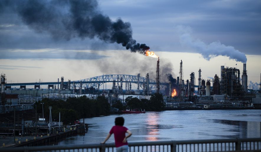 Flames and smoke emerge from the Philadelphia Energy Solutions Refining Complex in Philadelphia, Friday, June 21, 2019. (AP Photo/Matt Rourke)