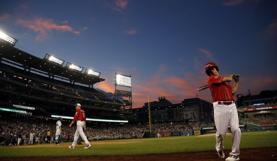 Sen. Rand Paul, R-Ky., waits to bat during the third inning of the Congressional Baseball Game at National's Park in Washington, Wednesday, June 26, 2019. (AP Photo/Carolyn Kaster)