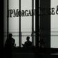 This Oct. 21, 2013, file photo shows the JPMorgan Chase &amp;amp; Co. logo displayed at their headquarters in New York. (AP Photo/Seth Wenig, File)