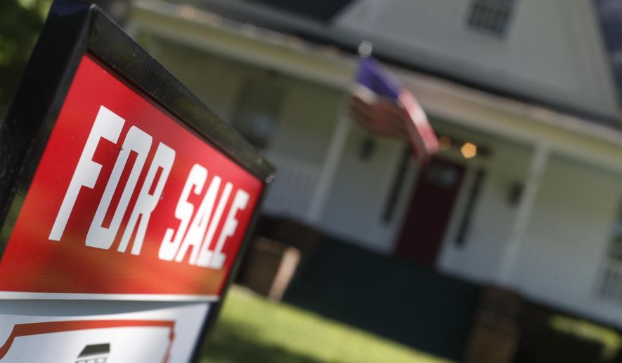 This June 20, 2019, photo shows an existing home is offered for sale in Rutledge, Ga. On Thursday, June 27, Freddie Mac reports on this week’s average U.S. mortgage rates. (AP Photo/John Bazemore)