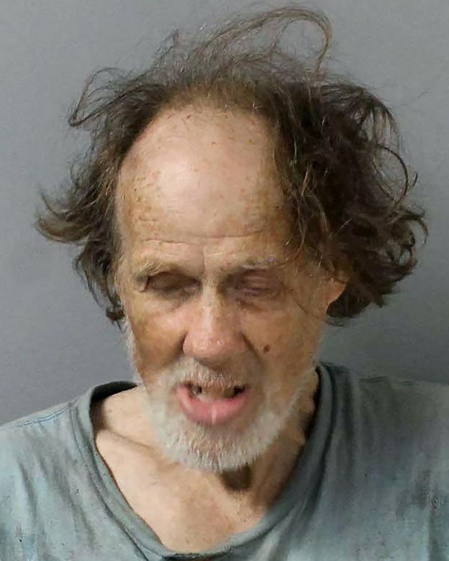 This Wednesday, June 26, 2019 booking photo from the Metro Nashville Police Department shows Timothy Donahoe. Police have arrested the homeless man in Tennessee who is accused of pushing a woman into traffic after she refused to give him money. News outlets report Donahoe was arrested Wednesday and charged with assault and reckless endangerment. (Metro Nashville Police Department via AP)