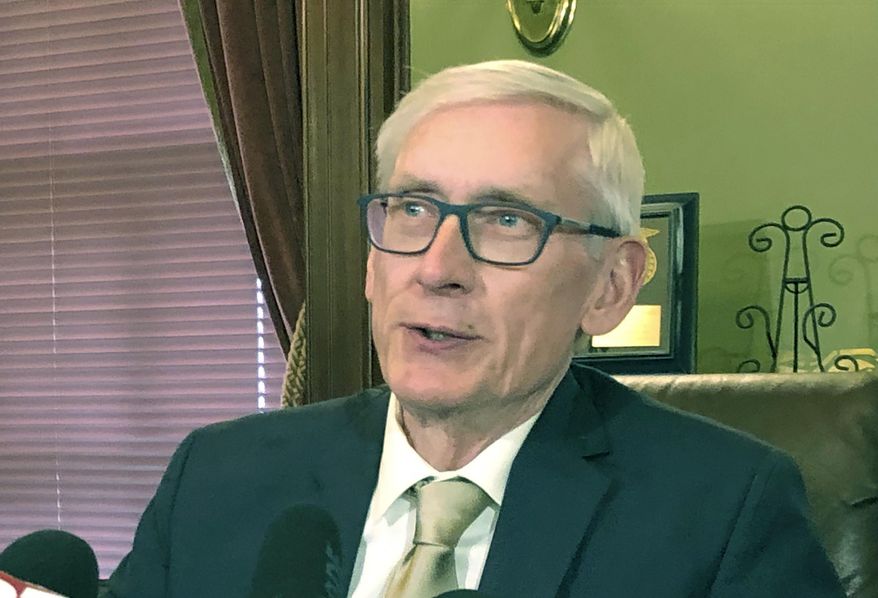 FILE - In this April 17, 2019, file photo, Wisconsin Gov. Tony Evers speaks during a news conference in Madison, Wisconsin. The U.S. Supreme Court's ruling Thursday, June 27 that federal courts have no place in policing political district boundaries means a challenge to Republican-drawn legislative boundaries in Wisconsin is likely over, leaving Democrats with little hope of gaining ground heading into the 2020 elections. Evers, a Democrat, issued a statement Thursday calling the U.S. Supreme Court's ruling "devastating for our democracy" and promising to veto any gerrymandered maps that land on his desk. (AP Photo/Scott Bauer, File)