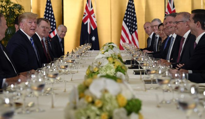 President Donald Trump, second from left, attends dinner with Australian Prime Minister Scott Morrison, second from right, in Osaka, Japan, Thursday, June 27, 2019. Trump and Morrison are in Osaka to attend the G20 summit. (AP Photo/Susan Walsh)