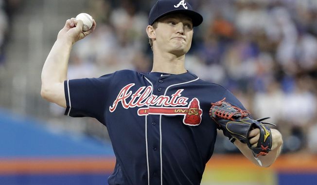 Atlanta Braves&#x27; Mike Soroka delivers a pitch during the first inning of a baseball game against the New York Mets, Friday, June 28, 2019, in New York. (AP Photo/Frank Franklin II)