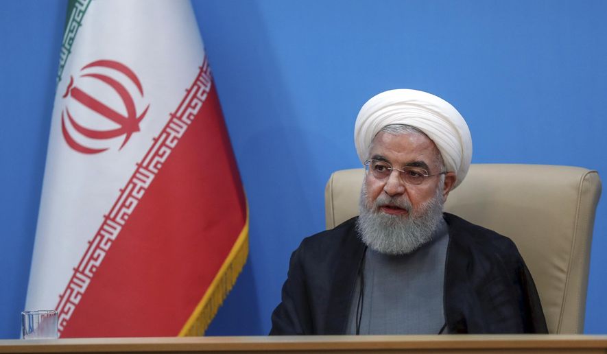 In this photo released by the official website of the office of the Iranian Presidency, President Hassan Rouhani attends a meeting with the Health Ministry officials, in Tehran, Iran, Tuesday, June 25, 2019. (Iranian Presidency Office via AP) ** FILE **