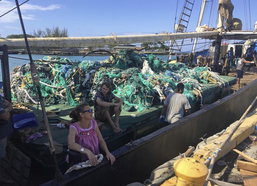 In this photo taken June 18, 2019, provided by the Ocean Voyages Institute, are nets brought in by the sailing ship Kwai from the Pacific gyre cleanup in Honolulu. Mariners on a sailing vessel hundreds of miles from the Hawaiian coast picked up more than 40 tons of abandoned fishing nets in an effort to clean a garbage patch in the Pacific Ocean, where the nets can entangle whales, turtles and fish and damage coral reefs. The crew of volunteers with the California-based nonprofit Ocean Voyages Institute fished out the derelict nets from a marine gyre between Hawaii and California known as the Great Pacific Garbage Patch during a 25-day expedition, the group's founder, Mary Crowley, announced Friday, June 28, 2019. (AJ Jaeger/Ocean Voyages Institute via AP)