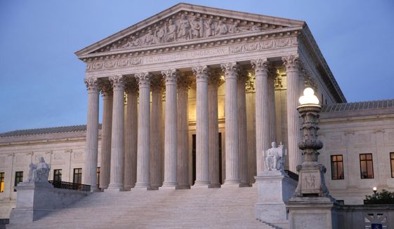 In this May 23, 2019 photo, the U.S. Supreme Court building at dusk on Capitol Hill in Washington. (AP Photo/Patrick Semansky)
